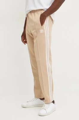 Zdjęcie produktu adidas Originals spodnie dresowe Adicolor Classics Beckenbauer Pant kolor beżowy proste IZ1857