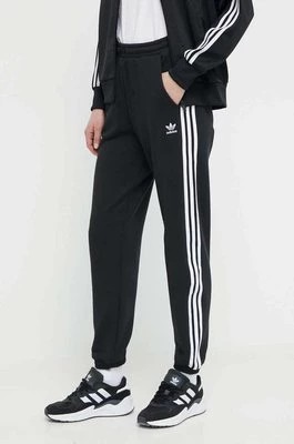 Zdjęcie produktu adidas Originals spodnie dresowe bawełniane Adicolor kolor czarny z aplikacją IB7457