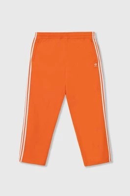 Zdjęcie produktu adidas Originals spodnie dresowe kolor pomarańczowy z aplikacją IR9894