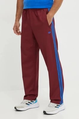 Zdjęcie produktu adidas Originals spodnie dresowe Trackpant kolor bordowy z aplikacją JN5977