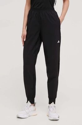 Zdjęcie produktu adidas Performance spodnie do biegania Own the Run kolor czarny gładkie IK7444