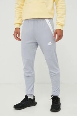Zdjęcie produktu adidas Performance spodnie dresowe męskie kolor szary gładkie