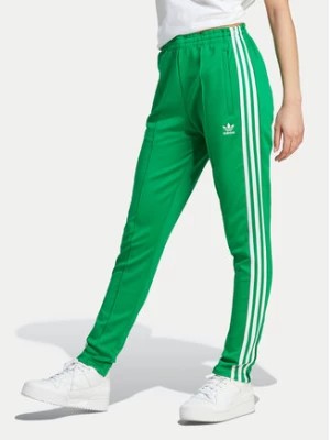 Zdjęcie produktu adidas Spodnie dresowe adicolor SST IK6601 Zielony Slim Fit