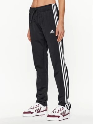 Zdjęcie produktu adidas Spodnie dresowe Essentials Warm-Up 3-Stripes H48451 Czarny Regular Fit