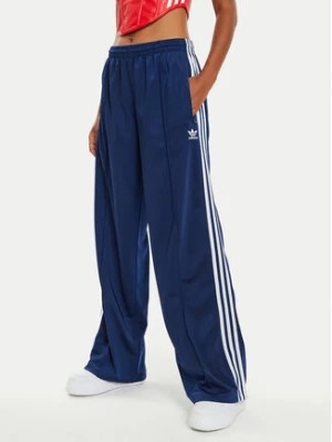 Zdjęcie produktu adidas Spodnie dresowe Firebird IL3817 Granatowy Loose Fit