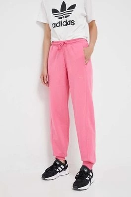 Zdjęcie produktu adidas spodnie dresowe kolor różowy gładkie