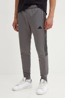 Zdjęcie produktu adidas spodnie dresowe Tiro kolor szary z aplikacją JI6381