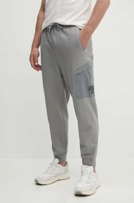 Zdjęcie produktu Armani Exchange spodnie dresowe bawełniane kolor szary gładkie
