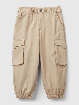 Zdjęcie produktu Benetton, Parachute Trousers In Stretch Cotton, size 116, Beige, Kids United Colors of Benetton