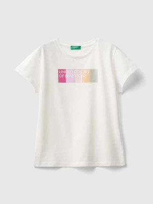 Zdjęcie produktu Benetton, T-shirt With Glittery Logo In Organic Cotton, size S, Creamy White, Kids United Colors of Benetton