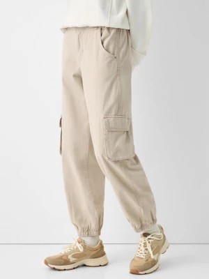 Zdjęcie produktu Bershka Bawełniane Spodnie Jogger Kobieta Piaskowy