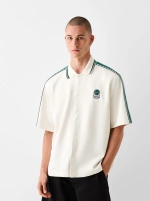 Zdjęcie produktu Bershka Koszula O Kwadratowym Kroju Z Interlockiem I Krótkim Rękawem Mężczyzna Biały Złamany