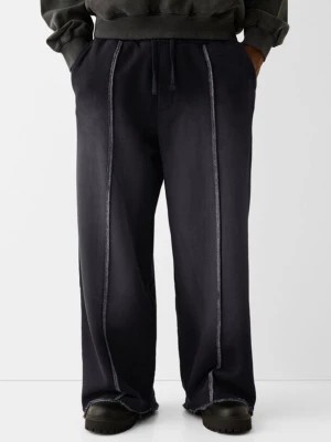 Zdjęcie produktu Bershka Spodnie Typu Wide Leg Z Efektem Sprania Mężczyzna Czarny