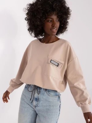 Zdjęcie produktu Beżowa krótka bluzka damska na co dzień ze ściągaczem RELEVANCE