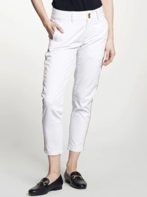 Zdjęcie produktu Białe spodnie damskie z lampasem OCHNIK