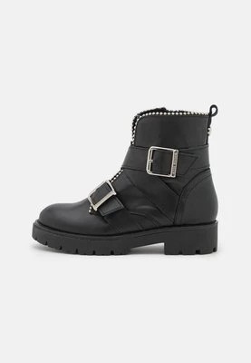 Zdjęcie produktu Botki kowbojki i motocyklowe Steve Madden