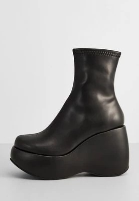 Zdjęcie produktu Botki na koturnie Jeffrey Campbell