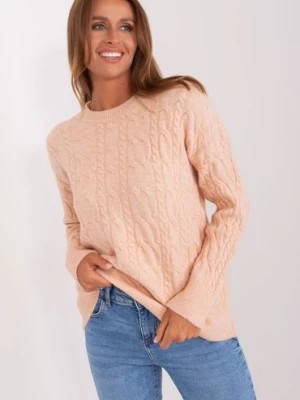 Zdjęcie produktu Brzoskwiniowy luźny sweter damski z modnym splotem