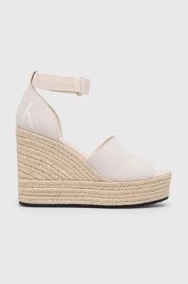 Zdjęcie produktu Calvin Klein Jeans sandały WEDGE SANDAL WIDE SU CON damskie kolor beżowy na koturnie YW0YW00963