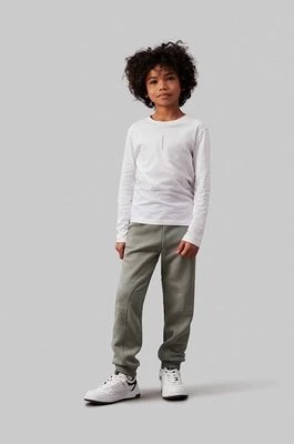 Zdjęcie produktu Calvin Klein Jeans spodnie dresowe dziecięce FLEECE JOGGER kolor zielony gładkie IB0IB02123