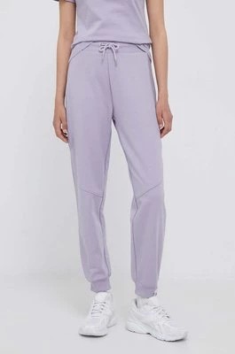 Zdjęcie produktu Calvin Klein Jeans spodnie dresowe kolor fioletowy gładkie