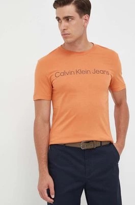 Zdjęcie produktu Calvin Klein Jeans t-shirt bawełniany kolor pomarańczowy z nadrukiem