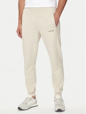 Zdjęcie produktu Calvin Klein Spodnie dresowe Micro Logo K10K109940 Beżowy Regular Fit