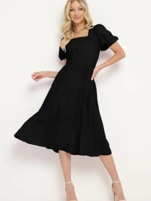 Zdjęcie produktu Czarna Rozkloszowana Sukienka z Wiskozy z Wycięciem i Wiązaniem na Plecach Dimicia