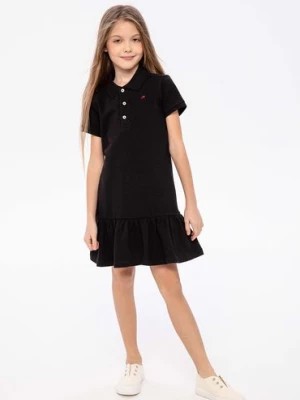 Zdjęcie produktu Czarna sukienka polo z krókim rękawem dla dziewczynki Minoti