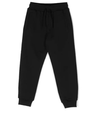 Zdjęcie produktu Czarne bawełniane spodnie z haftowanym logo Dolce & Gabbana