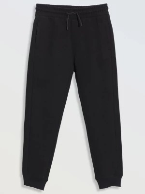 Zdjęcie produktu Czarne spodnie dresowe z dzianiny prążkowanej