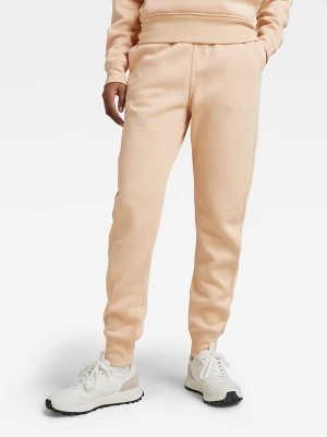 Zdjęcie produktu G-Star Spodnie dresowe w kolorze brzoskwiniowym rozmiar: S