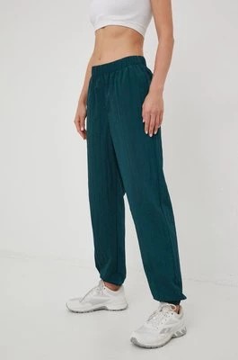 Zdjęcie produktu GAP spodnie dresowe damskie kolor zielony gładkie