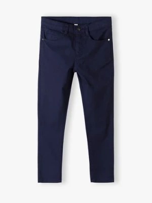 Zdjęcie produktu Granatowe eleganckie spodnie dla chłopca - slim - Lincoln&Sharks Lincoln & Sharks by 5.10.15.