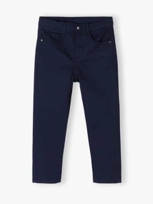 Zdjęcie produktu Granatowe eleganckie spodnie dla chłopca - slim - Max&Mia Max & Mia by 5.10.15.