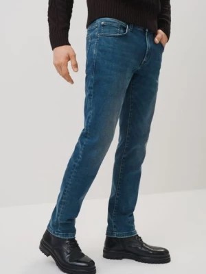 Zdjęcie produktu Granatowe jeansy męskie w stylu vintage OCHNIK