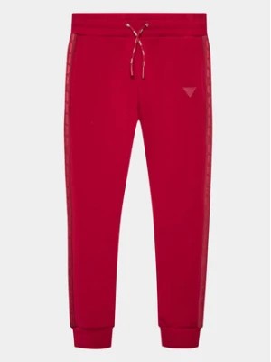 Zdjęcie produktu Guess Spodnie dresowe J2YQ24 FL03S Czerwony Regular Fit