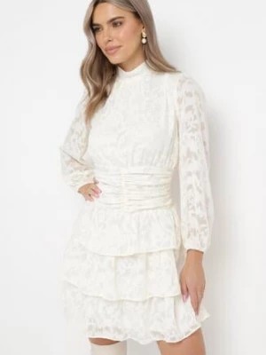 Zdjęcie produktu Jasnobeżowa Taliowana Sukienka Mini Koronkowa z Falbankami Ciluna