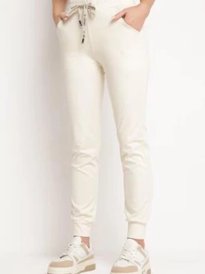 Zdjęcie produktu Jasnobeżowe Bawełniane Spodnie Dresowe o Dopasowanym Fasonie ze Sznurkiem w Pasie Sordia