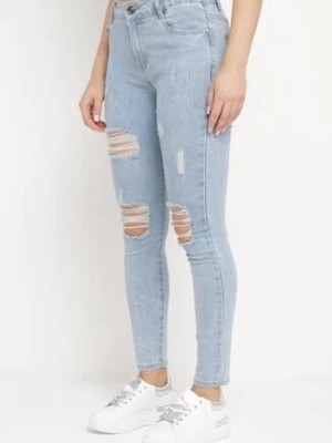 Zdjęcie produktu Jasnoniebieskie Klasyczne Dopasowane Jeansy na Suwak z Przetarciami Anenstala