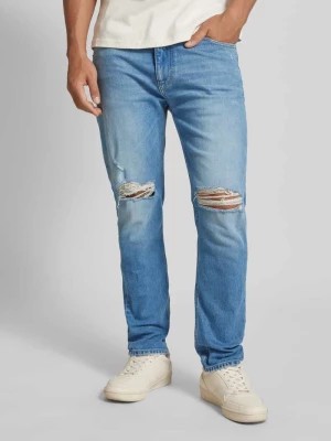 Zdjęcie produktu Jeansy o kroju tapered fit z przetarciami model ‘DAD JEAN’ Tommy Jeans