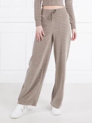Zdjęcie produktu Juicy Couture Spodnie dresowe BEXLEY | flare fit