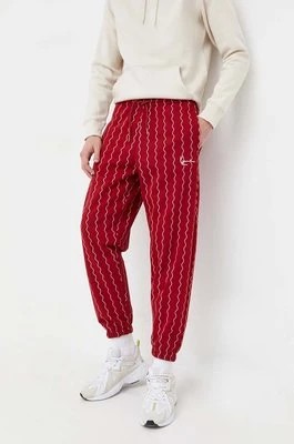 Zdjęcie produktu Karl Kani spodnie dresowe kolor czerwony wzorzyste