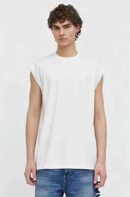 Zdjęcie produktu Karl Kani t-shirt bawełniany męski kolor beżowy
