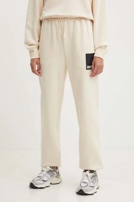 Zdjęcie produktu Karl Lagerfeld Jeans spodnie dresowe kolor beżowy z nadrukiem 245J1000