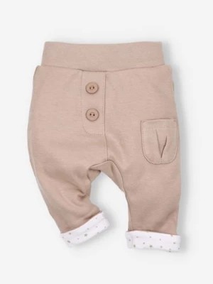 Zdjęcie produktu Kawowe spodnie niemowlęce z bawełny organicznej dla dziewczynki NINI