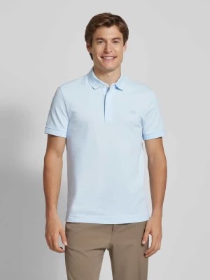 Zdjęcie produktu Koszulka polo o kroju regular fit z naszywką logo model ‘CORE’ Lacoste