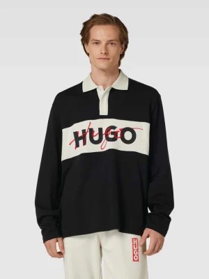 Zdjęcie produktu Koszulka polo z nadrukiem z logo model ‘Dilvret’ HUGO