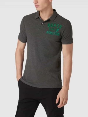 Zdjęcie produktu Koszulka polo z wyhaftowanym logo model ‘VINTAGE SUPERSTATE’ Superdry