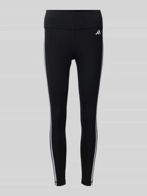 Zdjęcie produktu Legginsy sportowe o kroju tight fit z nadrukiem z logo ADIDAS SPORTSWEAR